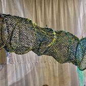 Crocodile trap made from ghost nets